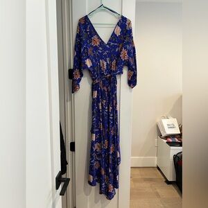 Long Diane Von Furstenberg wrap dress. Floral print with short flowing sleeves.